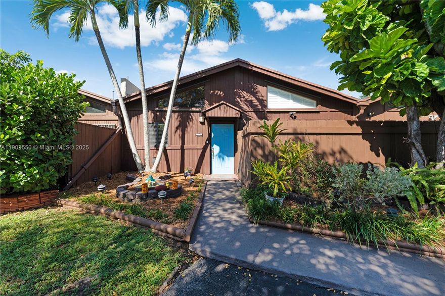 Escape the ordinary in this stylish, one-story, 2-bedroom, 2-bath townhome tucked inside the tree-lined streets of Killian Pines, where indoor comfort meets backyard bliss. This special home oozes positive vibes and was once the community's model home.  Step inside to light-filled spaces, vaulted ceilings, and a sleek open kitchen with stainless steel appliances and modern finishes. In a seamless blend of indoor and outdoor living, the real showstopper awaits outdoors. A private retreat with a wood deck and an above-ground plunge pool perfect for cooling off or unwinding under the stars. Impact windows and a low-fee HOA make this the ideal blend of peace of mind and laid-back Miami living. Turn the key and start your next chapter in one of Kendall’s most loved communities.