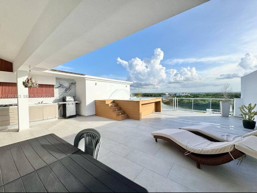 Fully furnished penthouse in Cana Pearl at Cana Bay, directly across from Hard Rock Hotel & Casino Punta Cana. Built in 2024, this 2BR/2BA residence offers approx. 2,882 sq ft total, including an expansive ~1,475 sq ft private rooftop terrace designed for true indoor-outdoor living. Enjoy a 12-person jacuzzi with waterfall feature, outdoor kitchen, and generous entertaining space—an extremely rare offering in the community. Interior features include modern finishes, porcelain flooring, Italian granite countertops, and brand-new, turnkey furnishings.

Located within a gated, amenity-rich community with 24-hour security, pool, gym, sports courts, and beach club access. Overlooking the golf course with proximity to tennis and paddle courts. This property is Airbnb-friendly and positioned for strong short-term rental income, making it ideal as a luxury second home or high-performing investment in one of Punta Cana’s most sought-after resort corridors.

Eligible for CONFOTUR tax incentives, including exemption from transfer tax and property tax (IPI) for up to 15 years. Projected gross ROI of approximately 7%–10% annually based on short-term rental performance in the Cana Bay market.

Currently has a 6-month lease expiring May 2026, expected to renew in 6-month terms until sold, with a 45-day lease termination clause. See video(s)