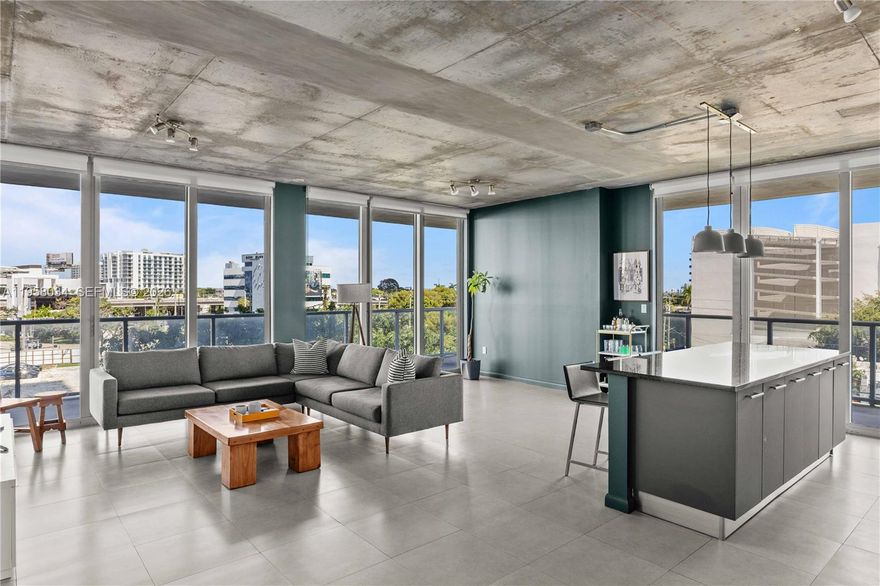 Bright corner 2-bedroom residence at 2 Midtown Miami, offering one of the largest two-bedroom layouts in the building. This 4th-floor home features an open floor plan with floor-to-ceiling windows, great natural light, and a spacious balcony. The kitchen features upgraded cabinetry and new appliances, including cooktop, washer, dryer, dishwasher, and a brand-new AC unit. Both bedrooms offer white porcelain floors, ample closet space, and en-suite bathrooms, providing comfort and privacy. A rare feature in Midtown, the unit includes tandem parking for two vehicles. Residents enjoy resort-style amenities including a pool, hot tub, fitness center, concierge, and 24-hour security. Ideally located just steps from the Miami Design District, Wynwood, Trader Joe’s, and Midtown’s best dining and shopping.
