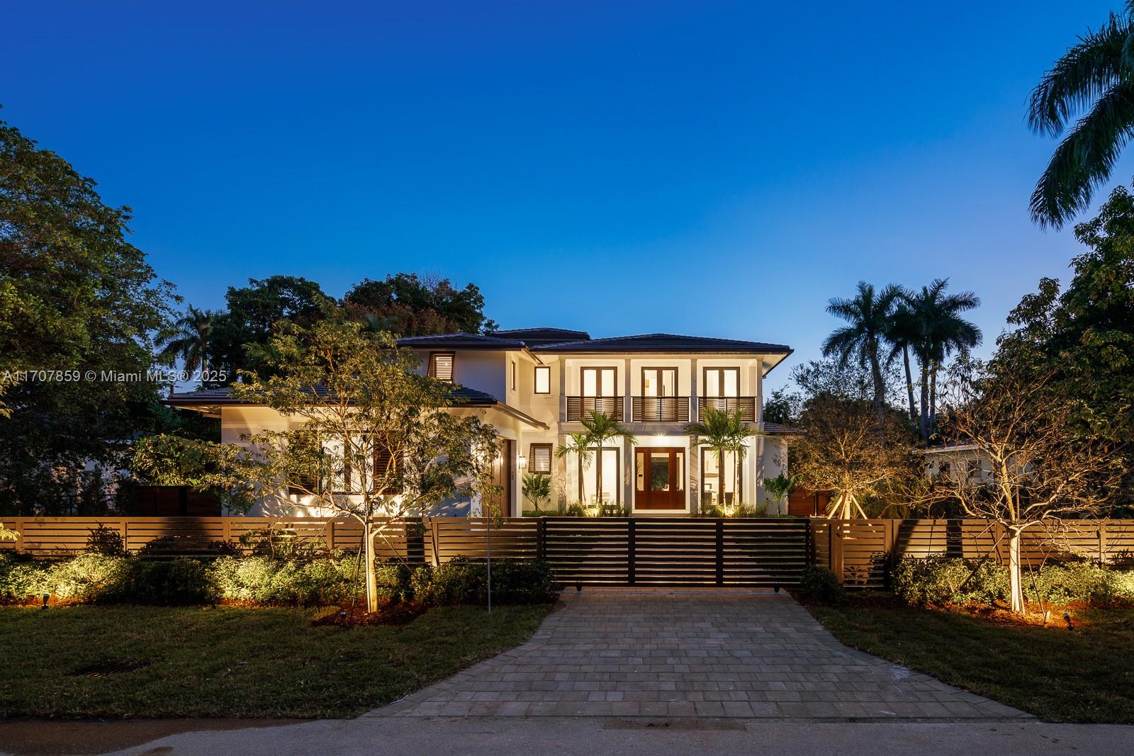 Introducing an extraordinary collaboration of sensibility and luxury in the idyllic Dante Fascell Park neighborhood of South Miami. Built for the most particular Buyer w/ a discerning eye for quality and design, this gated beauty boasts 5,951 tsf with exceptional details, fabulous floor plan, and timeless style inside & out. A masterful poolside kitchen w/ 6-seat island, the finest appliances, and beautiful cabinetry are heart of the home, encircled by covered terrace, superb family room, fireplace, wet bar, formal spaces, and elegant office. A magazine-quality master suite is divine by all standards and accompanies 3 bedrooms and cozy den upstairs. Honorable mentions include hardwood floors, fabulous surfaces, summer kitchen, stone patio, double-height garage, and exotic trees and flora.