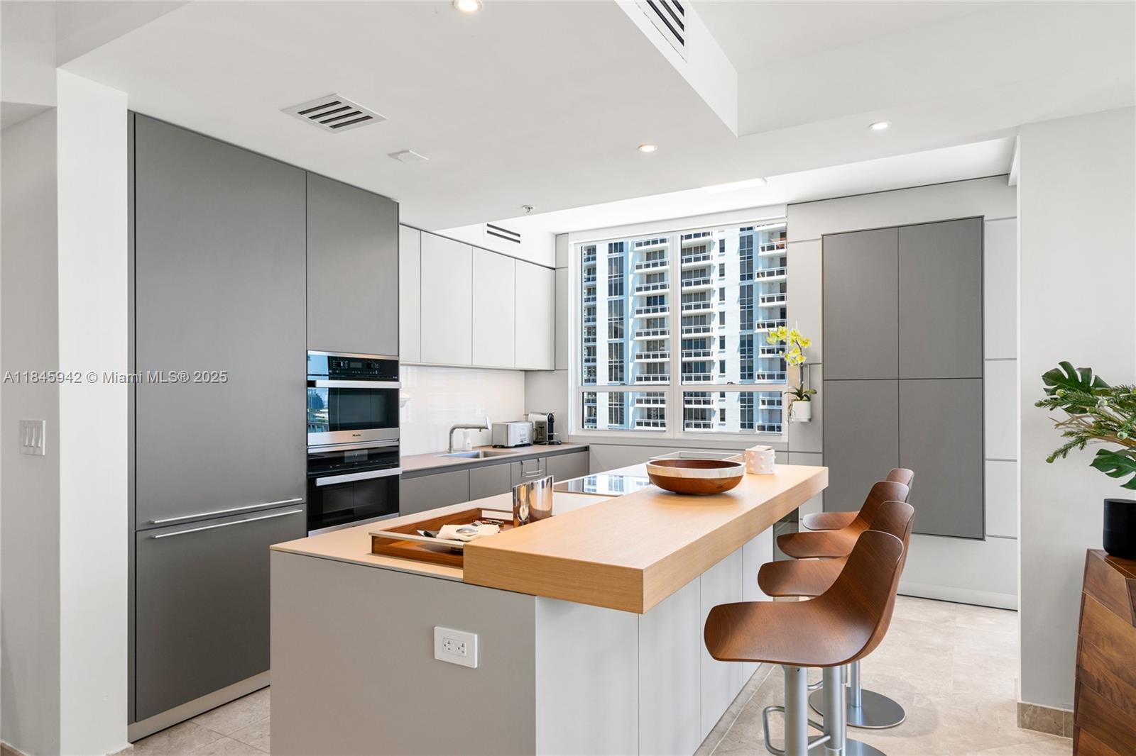 This fully remodeled 2-bedroom, 2.5-bath apartment is located in the heart of Brickell Key. Designed with both comfort and style in mind, the spacious layout features high-end finishes, sleek modern design, and top-of-the-line Miele appliances throughout.
Every room in the apartment boasts large windows offering spectacular bay and city views, filling the space with abundant natural light. Offered fully furnished or unfurnished.