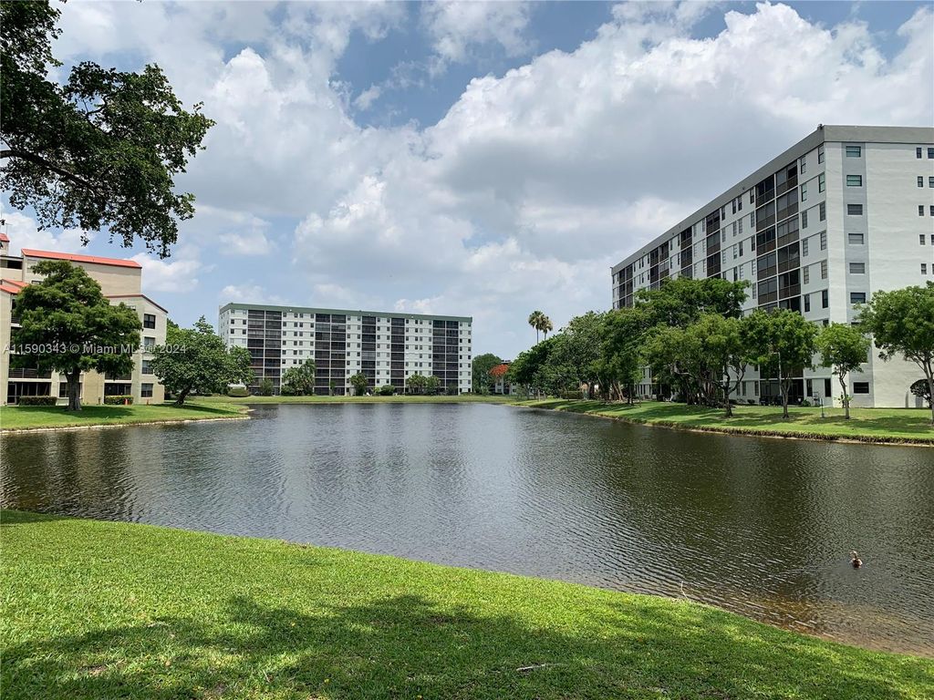 Photo of 2209 S Cypress Bend Dr #401, Pompano Beach, FL 33069 (MLS # A11590343)