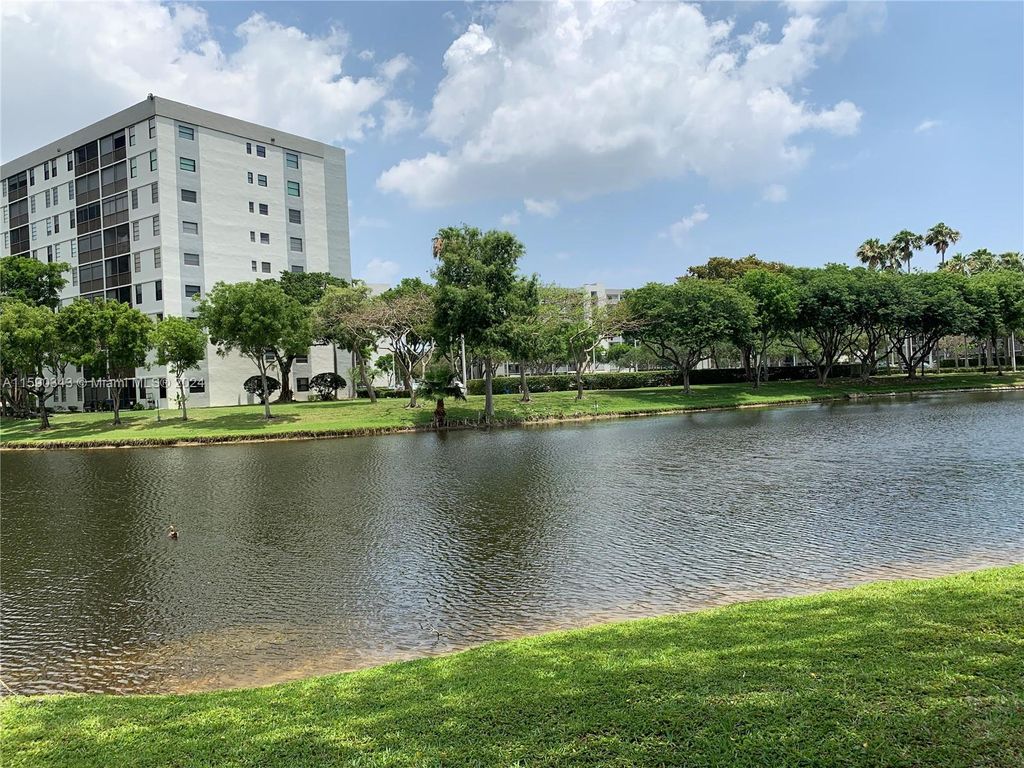 Photo of 2209 S Cypress Bend Dr #401, Pompano Beach, FL 33069 (MLS # A11590343)