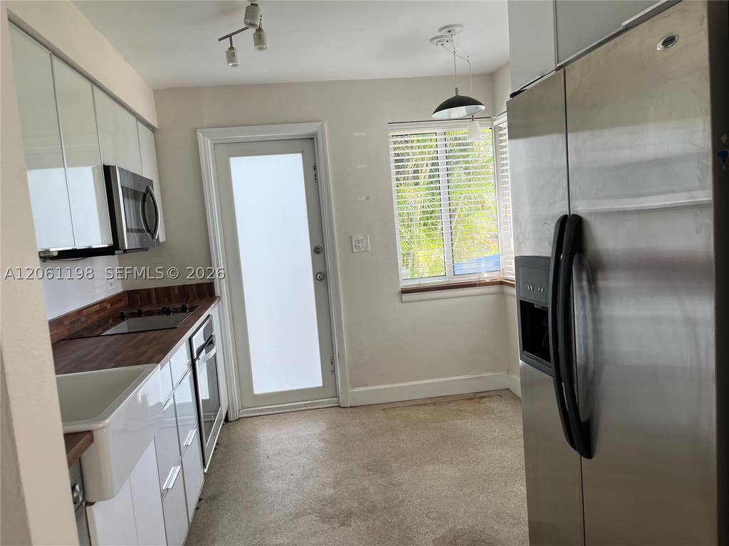 Photo of 1409 NE 21st St, Wilton Manors, FL 33305 (MLS # A12061198)