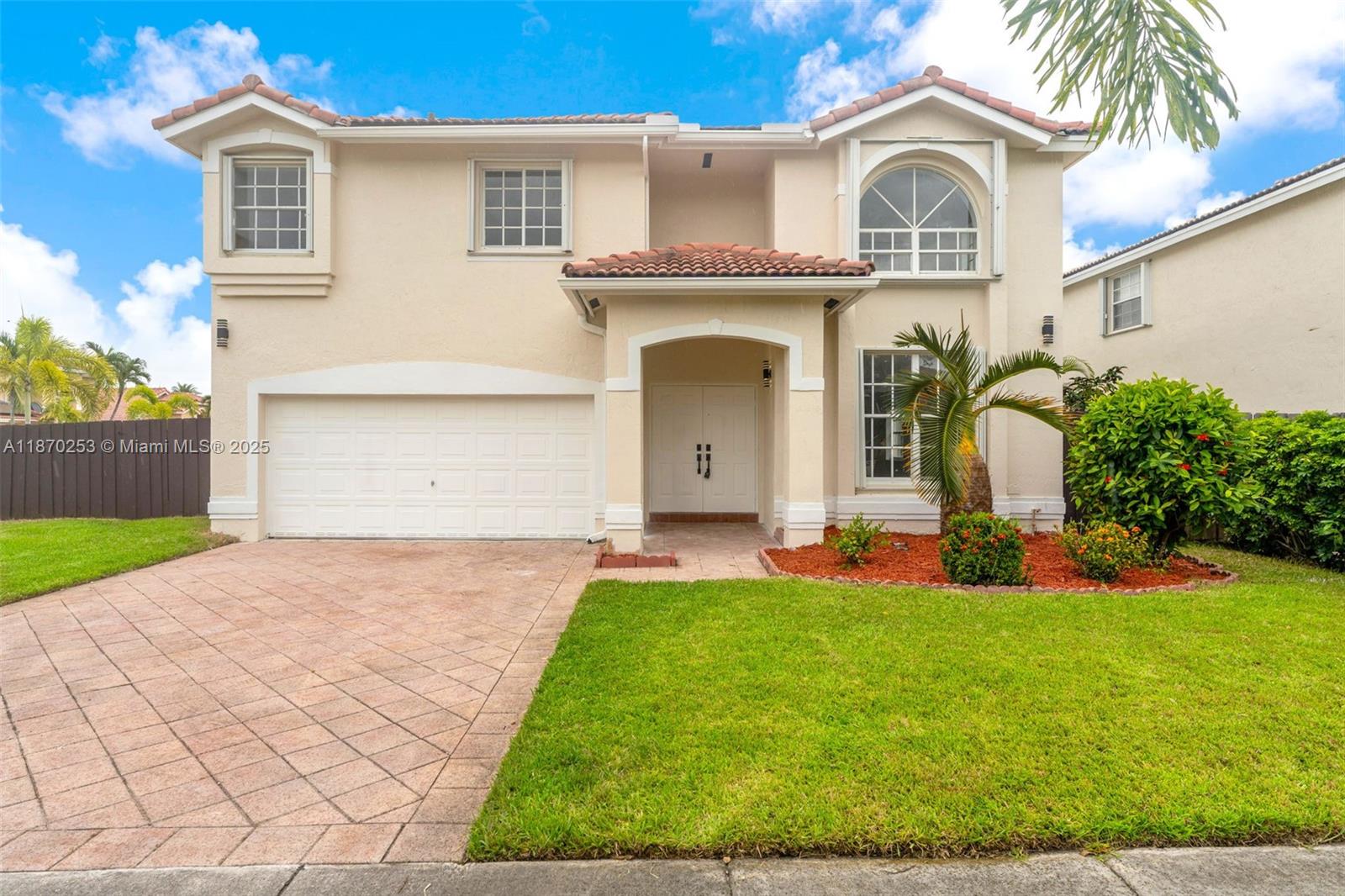 Beautifully updated 4BR/2.5BA home in prime Kendall location. Spacious layout features vaulted ceilings, expansive living/dining area, modern kitchen with quartz counters, new stainless steel appliances, porcelain floors downstairs & wood-style laminate upstairs. Large primary suite with custom walk-in closet & upgraded bath plus 3 bedrooms upstairs. First-floor office/den, 2-car garage, and fully fenced lot with room for pool. Quiet, well-kept community with top-rated schools. New tile roof in progress.