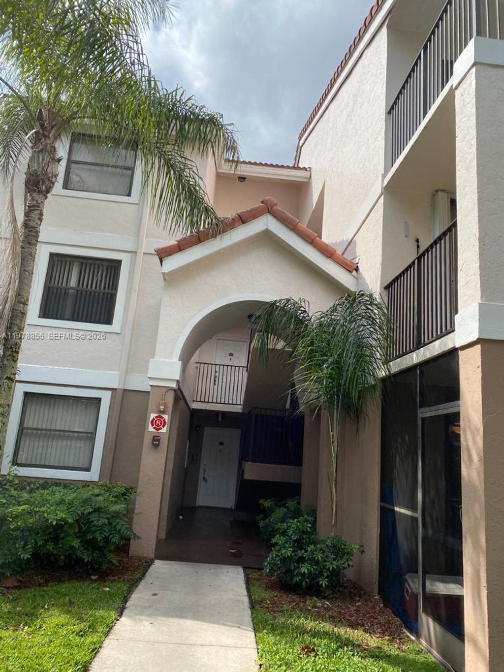 Photo of 10105 W Sunrise Blvd #201, Plantation, FL 33322 (MLS # A11978855)