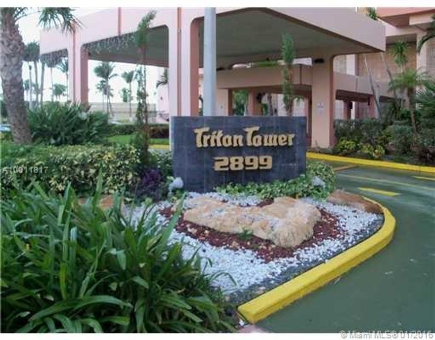 Triton Towers ideally located with restaurants, market, dry clean, grooming all downstairs.  Building has around the clock security, two swimming pools and gym.  Unit on 11th floor, fully furnished, with balcony with a partial ocean view and full view of Indian Creek canal and city beyond.  Floors are tiled and kitchen updated.  Parking in garage for one vehicle is available.