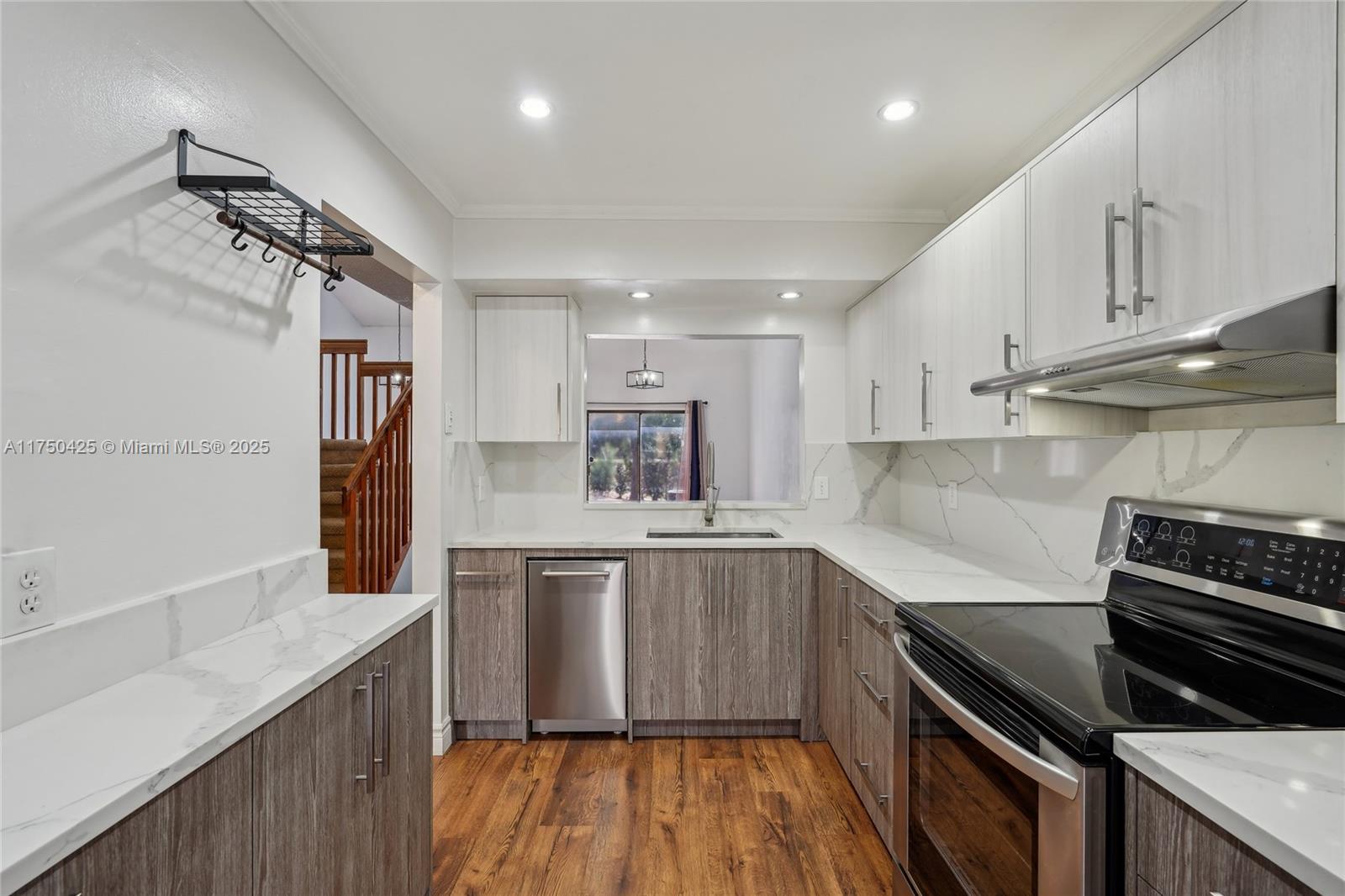 Don’t miss this rare opportunity to own a beautifully updated townhome in the desirable Sandpiper Woods of Dania Beach! Enjoy the Florida lifestyle with a five minute drive to Hollywood North Beach, West Lake Park, and Anne Kolb Nature Center. This home features a first-floor bedroom, an open loft as a second bedroom, including a unique barn door upstairs. The modern kitchen boasts new cabinets and appliances, while the living and dining areas open to a private patio. Additional highlights include a newer washer/dryer, skylight, and brand-NEW ROOF. Conveniently located near major highways, shopping, and dining. This pet-friendly starter home is minutes from Ft. Lauderdale Airport. Schedule your showing today!