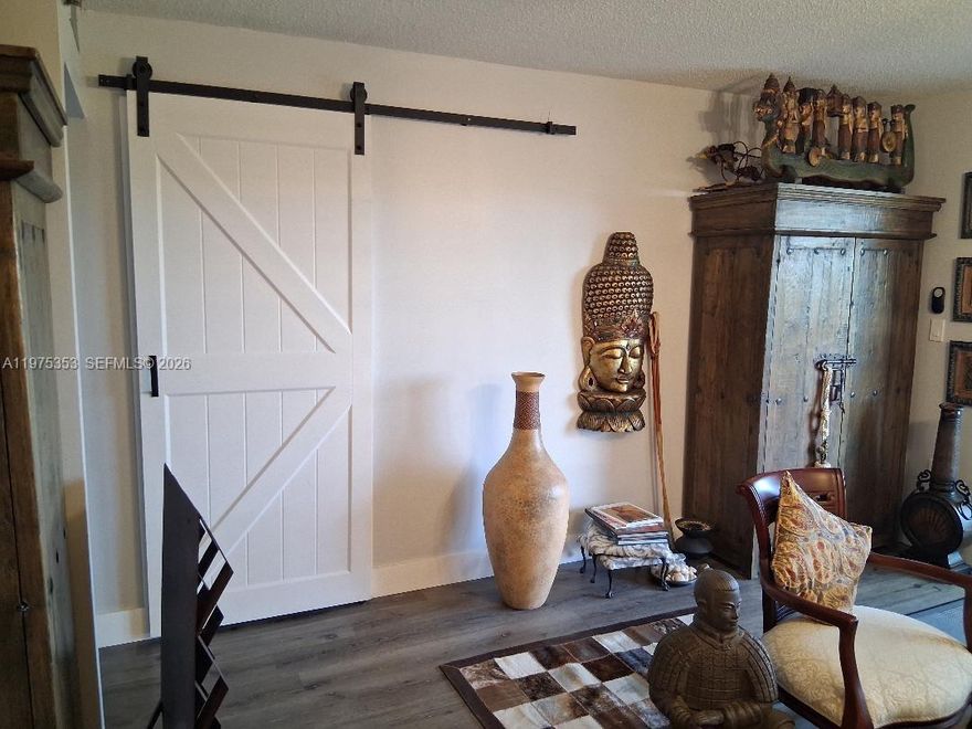 Just Beautiful...Renovated Kitchen and Baths...Stainless Steel appliances...Gorgeous flooring thru out...Pool view...This is what you call a home...Dining and Primary fixture doesn't convey...Second Bdrm w/Barn door...Tankless wht...Tiled Patio...Assoc requirements are 20% down, Minimum 700 CS and No Pets...