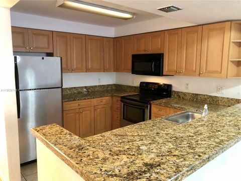 Photo of 5201 Geneva Way #102, Doral, FL 33166 (MLS # A11909746)