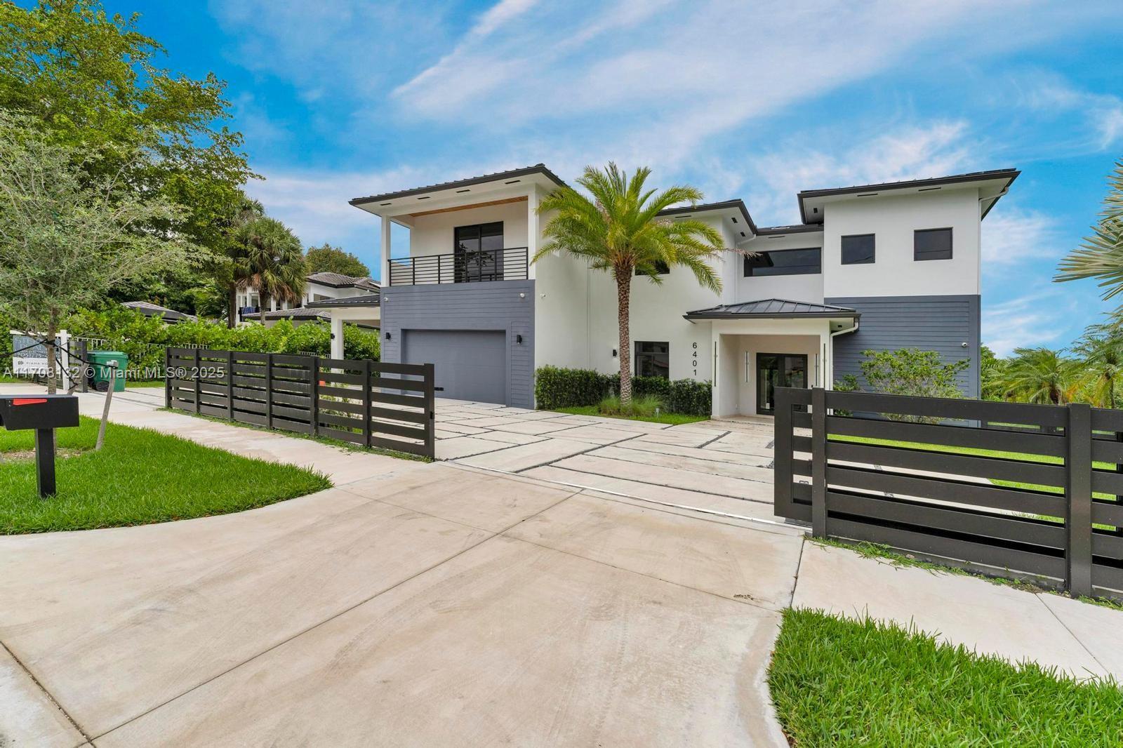 ABSOLUTE BEST PRICE in the AREA! Spectacular state-of-the-art two-story residence on a quiet one way street. At 7,895 sq ft, this home features 6 bedrooms, 7.5 bathrooms, all with en-suite baths and walk-in closets. Grand entrance, nice wide staircase, expansive living areas, large loft, and a zen-like backyard with a 15’x40’ pool and sunshelf. The chef’s kitchen boasts custom cabinets, high-end appliances, and a gas range. Spa-like master bath includes a soaking tub, large shower, and double sinks. Prewired for 16 cameras, music, internet, cable, and an alarm system. Modern finishes include large-format tiles, ShellStone terraces, and impact windows. Close to parks, transit, and shopping, including Dadeland Mall. With a 2-car garage, covered carport, and durable metal roof, a must see!