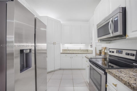 Tiny photo for 10720 NW 66th St #202, Doral, FL 33178 (MLS # A12034358)