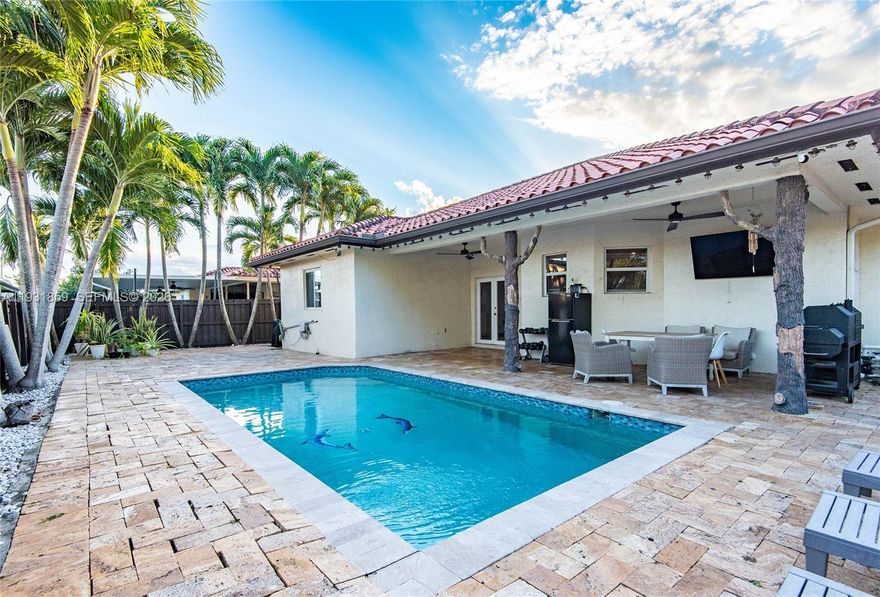 Welcome to Cutler Bay, a well-maintained Corner Lot home. This property features a private, fully fenced backyard with a sparkling pool, expansive paver patio, and a covered terrace ideal for outdoor dining, entertaining, or relaxing year-round. Covered Parking for a boat or RV.

The layout offers a connection between indoor and outdoor spaces, making the home perfect for gatherings and everyday comfort. Mature palm trees provide privacy and a tropical feel, while the spacious patio offers plenty of room for lounge seating, grilling, and poolside enjoyment.

Additional features include a covered carport, ample outdoor storage, and a quiet residential setting close to parks, schools, shopping, and major roadways. Located in a desirable Cutler Bay neighborhood, this home offers both convenience and lifestyle. 1-bedroom, 1-bath in-law suite, perfect for extended family, guests, or income-producing potential.

Whether you’re hosting friends, enjoying family time by the pool, or simply looking for a move-in-ready home with great outdoor space, this property checks all the boxes.