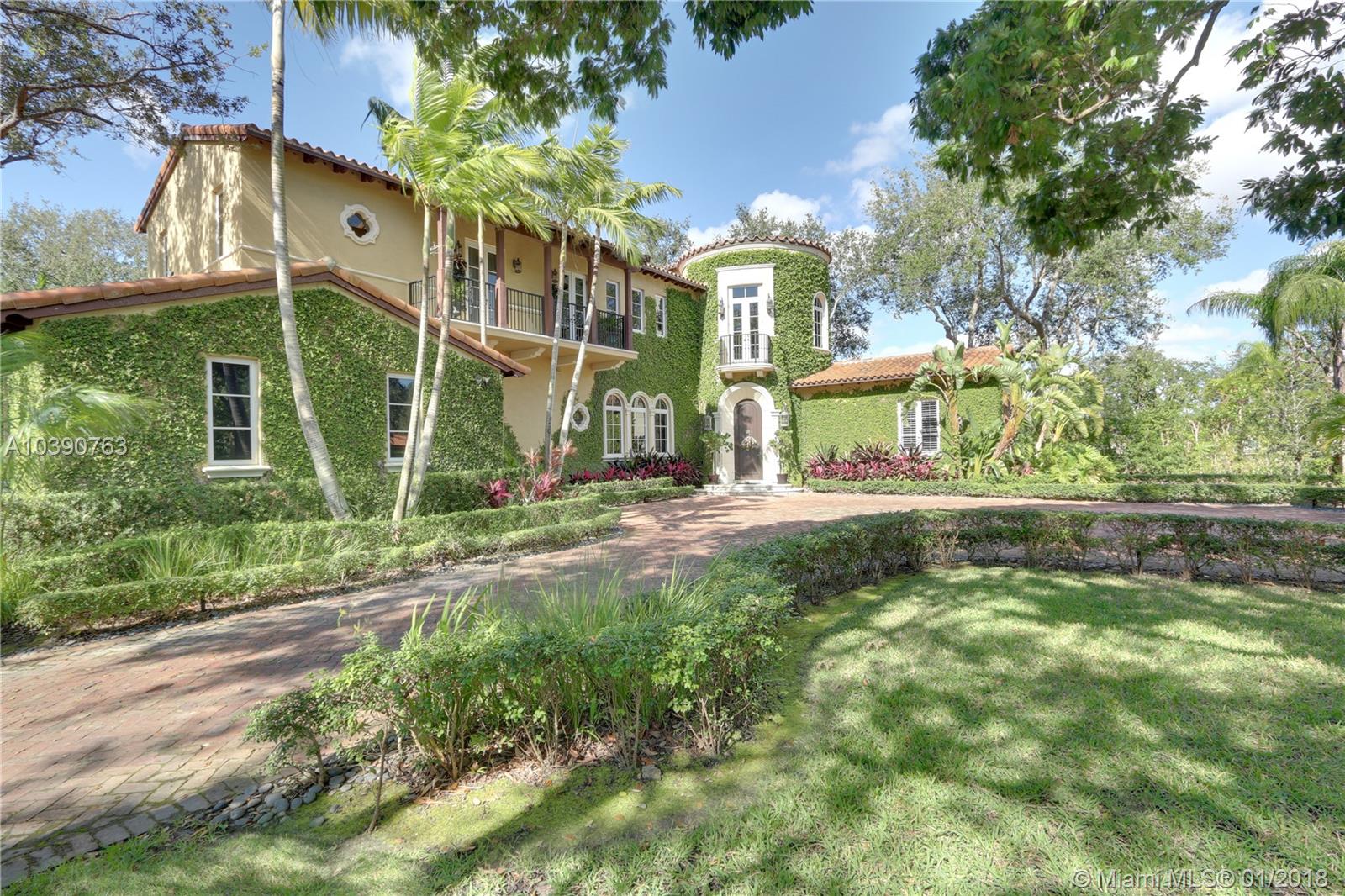 Giorgio Balli exquisite, secluded Mediterranean Estate tucked away on a quiet street in a cul-de-sac.  This estate is nestled on a green paradise adorned with mature trees & resort style pool area. State-of-art finishes & appliances throughout with arched doorways & soaring ceilings.  Impeccable craftsmanship comes to light right from the entrance with a stunning beamed cathedral foyer ceiling and gorgeous ironwork spiral staircase.  Ideal floorplan for privacy with 2 Bedroom suites on the ground floor and 2 more suites, plus the Master Suite.  Spacious and secluded Master Suite is a perfect sanctuary with a balcony overlooking the grounds.