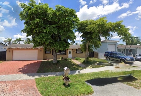Photo of 7925 NW 170th Ter, Hialeah, FL 33015 (MLS # A12090303)
