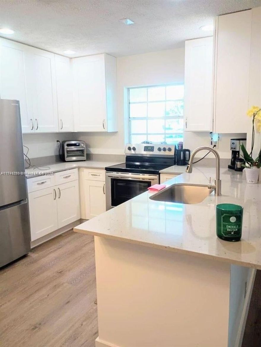 PRICE REDUCED!!!
CORNER VILA CAN BE CONVERTED TO 3 BEDROOMS, NEW OPEN KITCHEN WITH GRANITE COUNTERTOP, NEW STAINLESS STEEL APPLIANCES, NEW A/C, NEW WATER HEATER, NEW FLOOR, HURRICANE SHUTTERS, HAS CLOSETS AND WALKING CLOSET.
INCLUDED IN HOA: NEW POOL, FITNESS, TENNIS COURT, CLUBHOUSE, LIBRARY, WATER, ROOF INSURANCE, LANDSCAPNIG, INTERNET, CABLE TV WITH HBO/SHOWTIME AND OVER 1,000 CHANNELS, CAR PARKING NEAR HOME AND MANY GUEST PARKING WHERE CAN PARK WITHOUT RESTRICTION, YOU JUST PAY THE HOA AND ELECTRICITY BILL.
UNIT LOCATED IN BEST AND VERY CONVENIENT AREA, CLOSE TO ENTRACE OF THE COMMUNITY, CLOSE. TO ALL STORES YOU CAN WALK ACROOSS THE STREET, THE BOYS ITALIAN SUPERMARKET, PUBLIX, PHARMACIES, RESTAURANTS AND MORE. 
NO SPECIAL ASSESSMENT.
CAN BE SOLD FURNISHED FOR EXTRA MONEY.