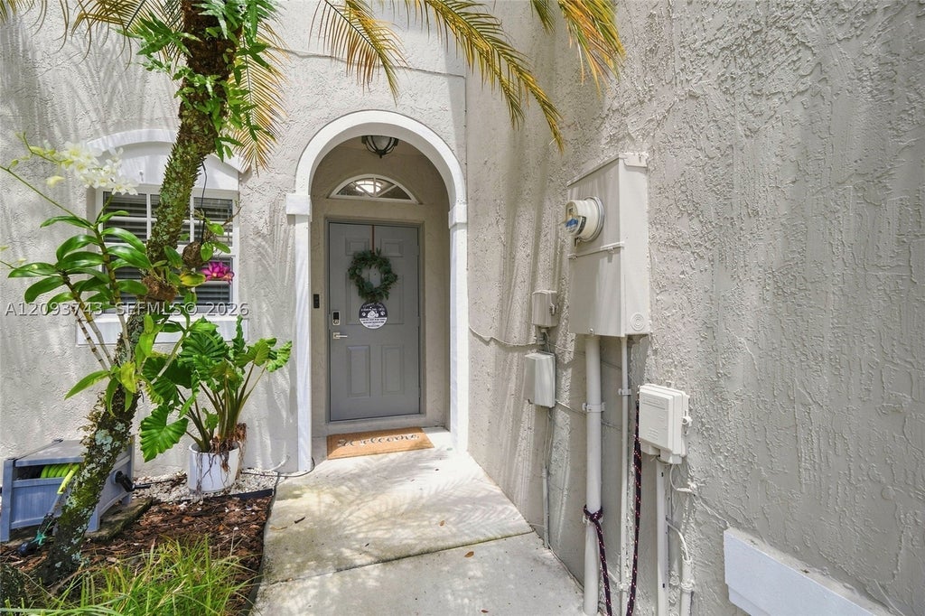 Photo of 13225 NW 7th Dr, Plantation, FL 33325 (MLS # A12093743)