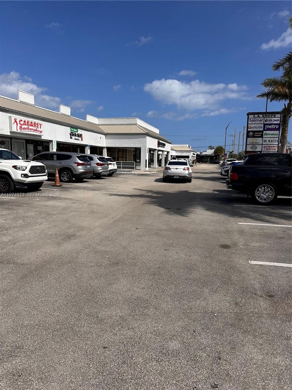 Photo of 89-99 E Oakland Park Blvd #89-99, Oakland Park, FL 33334 (MLS # A11974673)