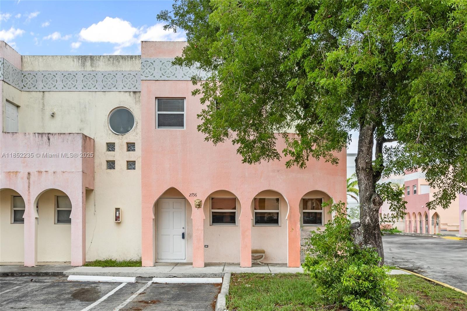 Charming 3-bed, 2.5-bath corner townhouse in the heart of Opa-locka! This well-maintained home features a spacious layout, updated tile floors, new ceramic tile on the first floor, new vinyl laminate floors on the second floor, and 2 assigned parking spaces in front of the property. Perfect for first-time buyers or investors, with easy access to schools, shopping, and major highways. Don't miss this affordable opportunity in a growing neighborhood! No rental restrictions. Rents approximately between $2,200-$2,600. Freshly painted.