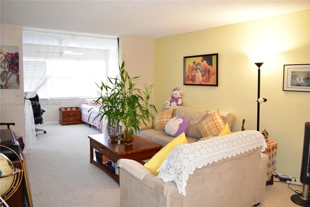 Photo of 9881 Sunrise Lakes Blvd #207, Sunrise, FL 33322 (MLS # A11996468)