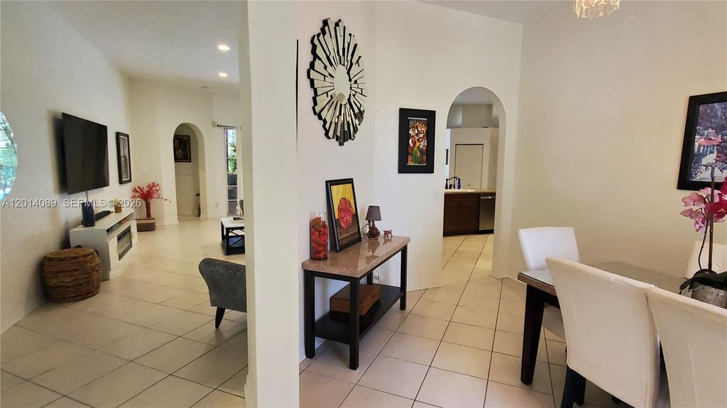 Photo of 2051 NW 125th Ter, Pembroke Pines, FL 33028 (MLS # A12014089)