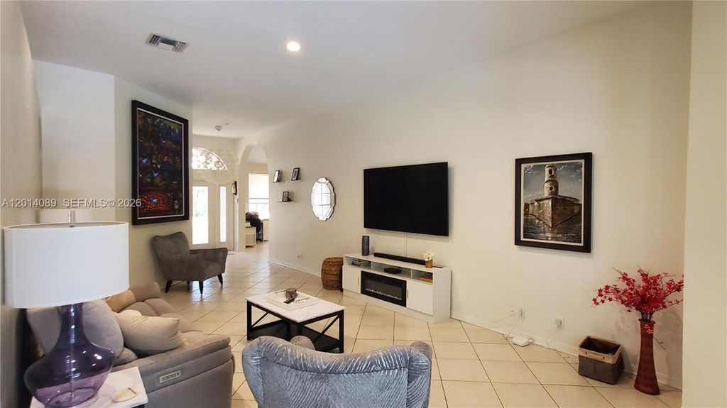 Photo of 2051 NW 125th Ter, Pembroke Pines, FL 33028 (MLS # A12014089)