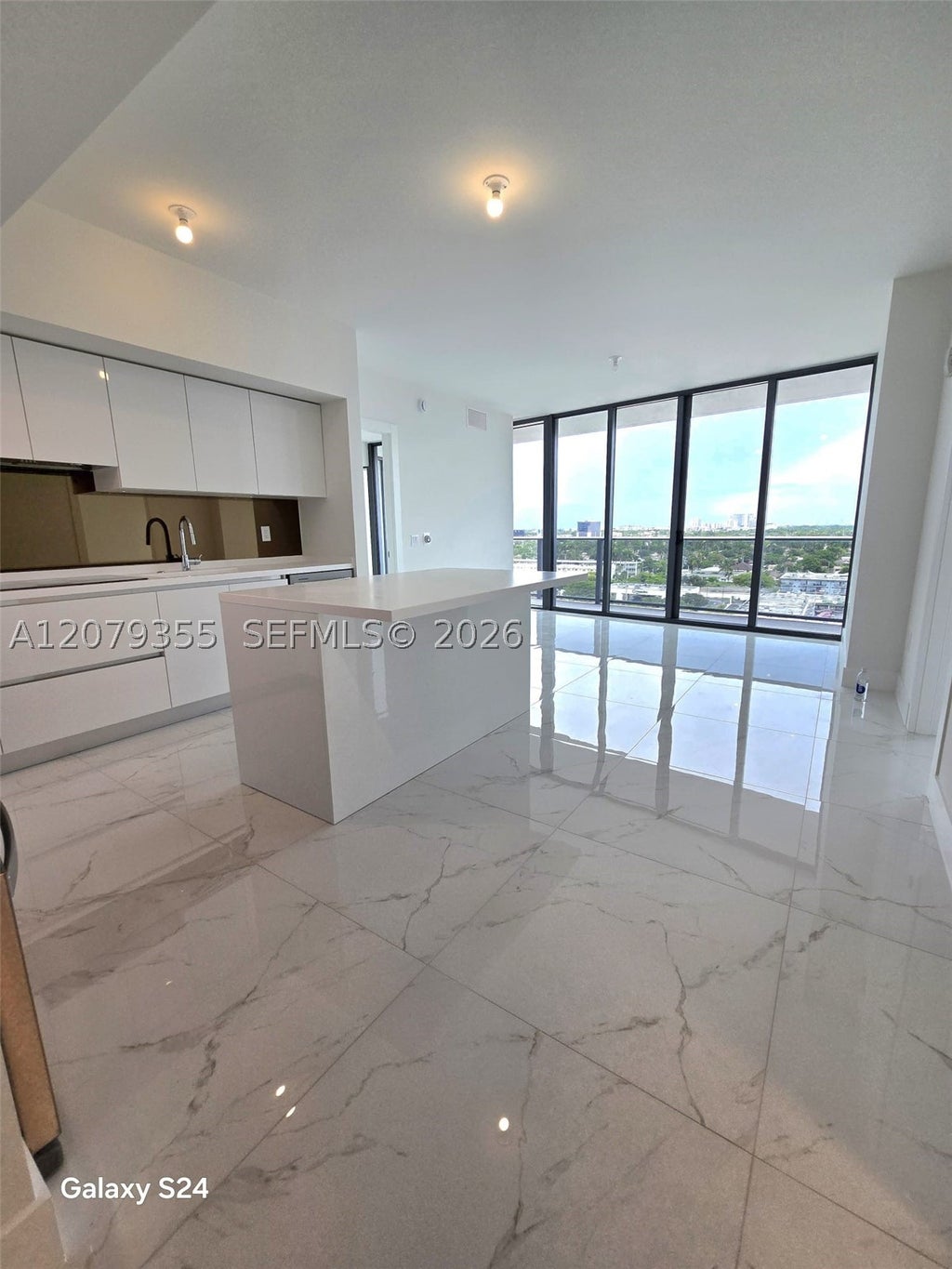 Photo of 1170 E Hallandale Beach Blvd #907, Hallandale Beach, FL 33009 (MLS # A12079355)