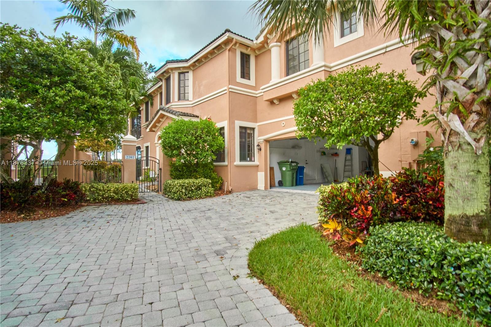 Exclusive Weston Hills location!! Elegant and very private townhouse in pristine condition. Features 2 bedrooms + Den (can be used as 3rd Bedroom), 2 baths with 2 Car Garage, First floor with double door entry. Open spacious master bedroom with walking-closet. Beautiful kitchen with granite countertops and stainless steel appliances. Separate laundry room. Hurricane impact windows and sliding door. Large private screened in patio. Breathtaking views of the golf course from the patio, master bedroom and living room. Paved & Enclosed Front Entrance. Courtside at Weston Hills's desirable location places is minutes from great grade A + schools, spacious recreational parks and Weston Town Center and I75.