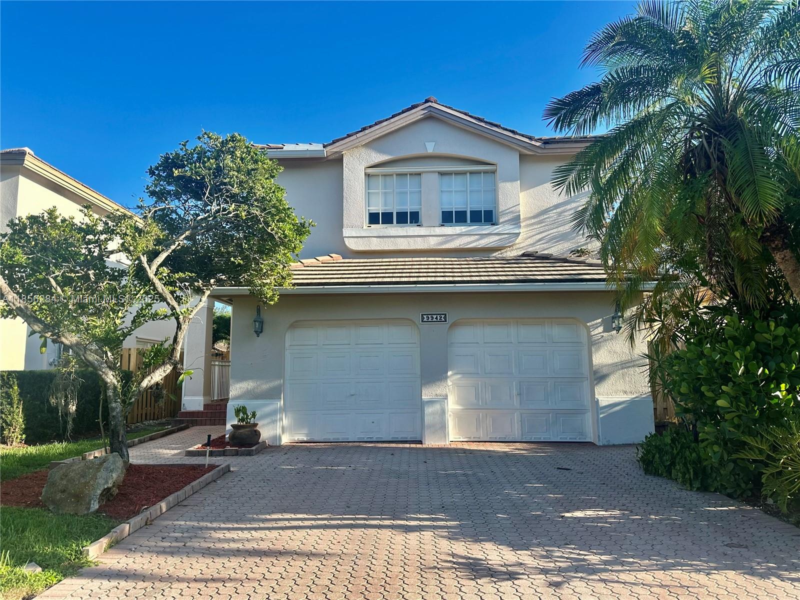 Beautiful 3-bedroom, 2.5 -bath home in the gated community of Costa Verde. Features a bright, open layout with double-height ceilings in the living room, leading to a private patio with space for a pool. Enjoy added privacy with one-story homes behind. The kitchen offers granite countertops and opens to a cozy family room. This property is a perfect blank canvas for renovations, ready to be customized to your taste. Costa Verde has one of the lowest HOA fees in the area and is close to major highways, top schools, restaurants, golf courses, the U.S. Southern Command, and Doral’s Central Park. Community amenities include a heated pool, large playground, and 24-hour security.