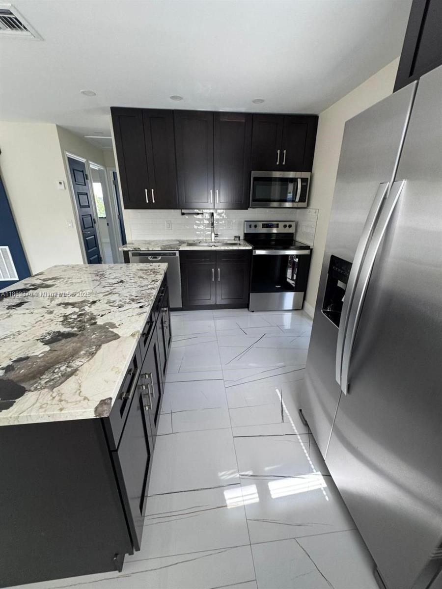 "Welcome home! This beautifully renovated 2-bedroom, 1-bath gem offers modern upgrades throughout. From the sleek finishes to the open layout, every detail has been thoughtfully designed. Perfect for anyone seeking comfort and style in a move-in-ready space."
Enjoy a cozy yet modern feel with brand-new finishes, updated kitchen and bath, and plenty of natural light. Perfect for families, professionals, or anyone ready to make it their home." The owner will maintain the lawn, small dog okay.