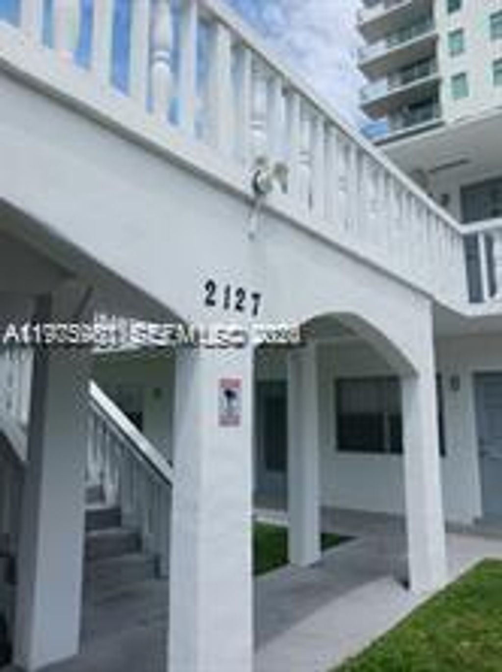 Photo of 2127 Van Buren St #203, Hollywood, FL 33020 (MLS # A11975980)