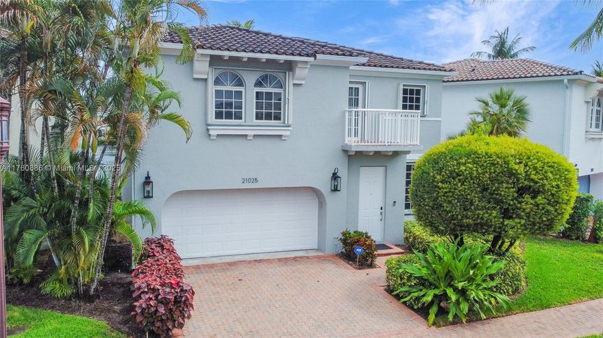 Welcome to this 3-bedroom, 2.5-bathroom home in prestigious gated community of Aventura Lakes. A unique location, with views overlooking a serene canal and fountain. Offering over 2,200 sq. ft. of living space, this residence features tile flooring throughout the first level and wood flooring on the second level. The primary suite boasts a large walk-in closet with built-in cabinetry, additional bedrooms also offer custom-built storage. A full-size laundry room, and accordion hurricane shutters provide peace of mind. Home is within walking distance to Chabad and Charter Sofer High School. Amenities including two swimming pools, gym and more. Great home with 24/7 security, on-site management, and a prime location near top-rated schools, world-class shopping, dining, and beautiful beaches.
