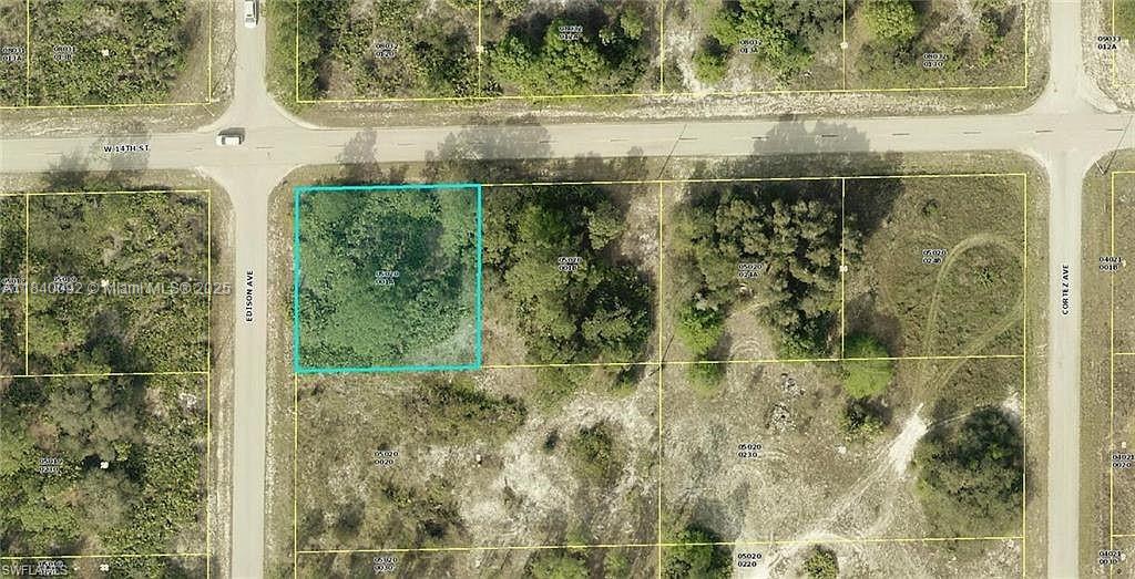 Prime corner lot at 14th St W and Edison Ave, ideally situated between Williams Ave and Richmond Ave. Enjoy convenient access to Lehigh Acres, just a short drive from Fort Myers and Punta Gorda airports, spring training facilities, and beautiful Gulf Coast beaches. The land is ready for residential build. Plans ready!