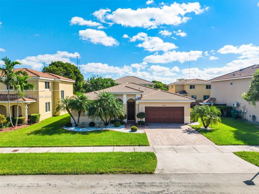 Welcome to your next home! This tastefully updated 3bd, 2ba home sits in the desirable gated community of Coconut Cay. The home features modern finishes throughout, including zebra blinds and smart switches. The kitchen was renovated in 2021 with quartz countertops, soft-close cabinets, and Samsung smart stainless-steel appliances. Bedrooms include custom California Closets, and the living area features a custom wet bar for entertaining. Additional highlights include a new Samsung washer and dryer (2025), 2021 A/C, and a converted garage with mini-split A/C, and a fully operational insulated door—perfect for a gym, office, or extra living space. Each room has ethernet, and the backyard offers space for a pool. Low HOA includes landscaping & alarm. Windows have shutters.100% Move-in ready!