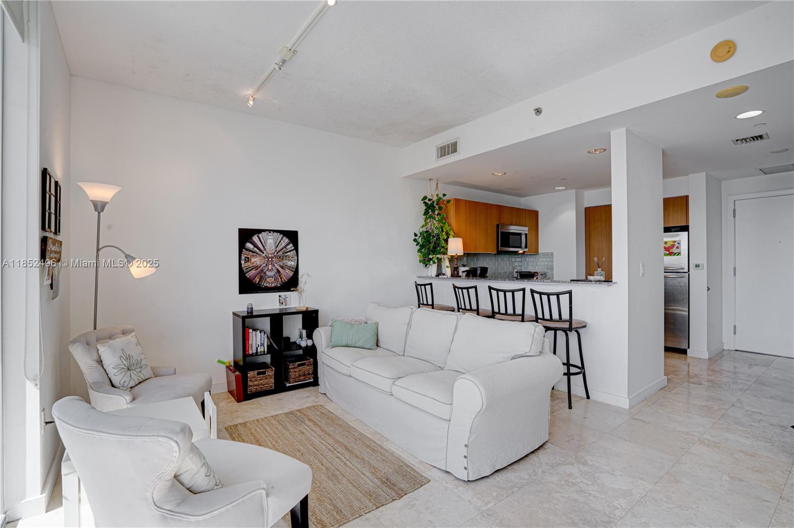 High Floor studio with beautiful view of Miami, Key Biscayne located in the heart of Brickell. impeccable unit with recent appliances, washer and dryer inside the unit, 1 Parking space assigned. 12 months lease only no exception. If active is available