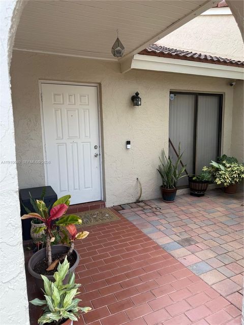 Photo of 17048 NW 66th Ct, Miami Lakes, FL 33015 (MLS # A11910640)