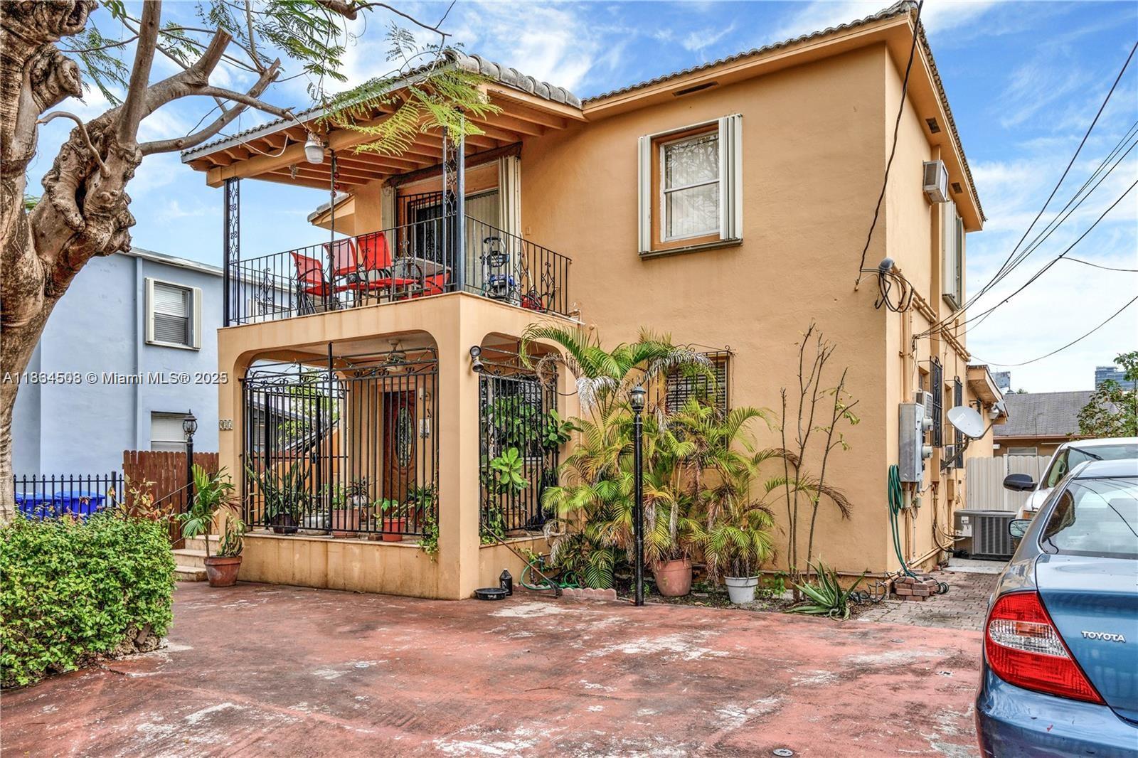 Discover this rare investment opportunity in the heart of Little Havana, right on the iconic Calle Ocho! Currently operating as a triplex, this beautifully renovated property with a 2024 metal roof is both move-in ready and investment ready, giving you the flexibility to live in one unit while generating income from the others—or maximize returns by renting all three.
The property features 3 spacious units, each with its own washer and dryer. Two 2/1 units, each with a balcony or porch, and the main apartment is a 2/2 with a large private backyard. All units are Airbnb-ready, with a 4.8+ star rating located just minutes from Brickell nightlife, shopping, dining, and more.