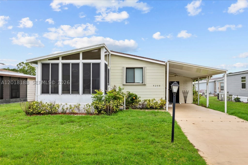 Photo of 8208 W Bitterbush Ln, Port St Lucie, FL 34952 (MLS # A12018188)