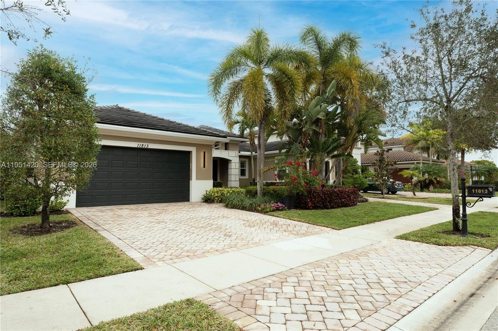 Photo of 11813 NW 79th Ct, Parkland, FL 33076 (MLS # A11951420)