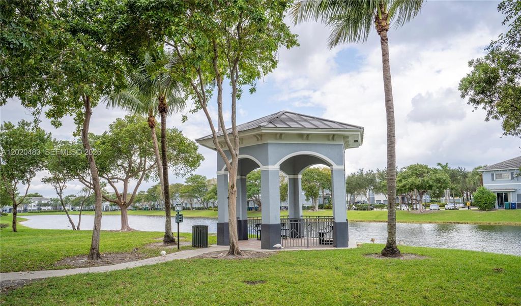 Photo of 1415 NW 34th Way, Lauderhill, FL 33311 (MLS # A12020483)
