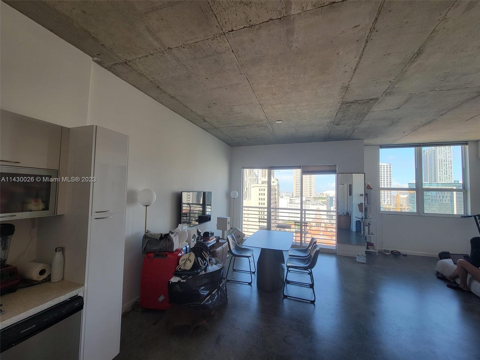 Open style loft featuring skyline views, polished concrete floors, 10 ft. ceilings and washer and dryer. The loft 2 is conveniently connected to the free metromover station and blocks away from Bayside Mall, Bayfront Park, Miami Heat Arena and the Brightline station, all in the heart of downtown. The building boasts a rooftop amenity dect with gym, sauna, pool and hot tub. Parking spaces are available for $60.00 a month in the garage across the street. Please note that the bedroom is not enclosed. Please see broker remarks.