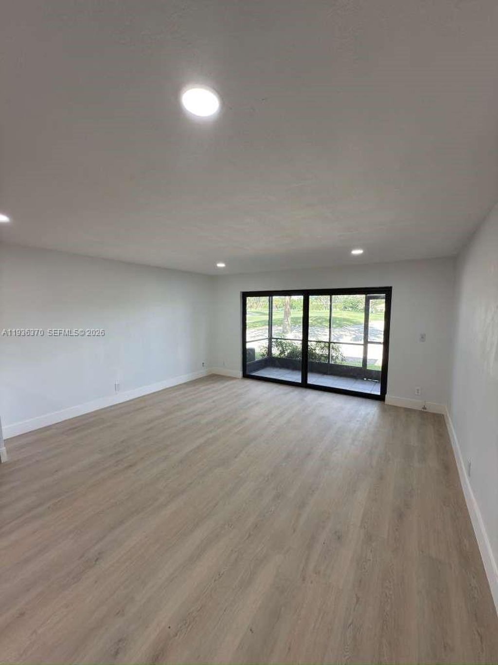 Photo of 9001 Jacaranda Ln #107, Plantation, FL 33324 (MLS # A11936370)