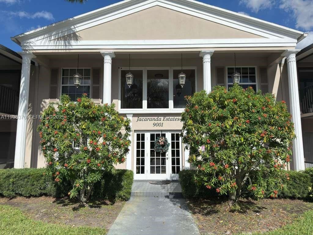 Photo of 9001 Jacaranda Ln #107, Plantation, FL 33324 (MLS # A11936370)