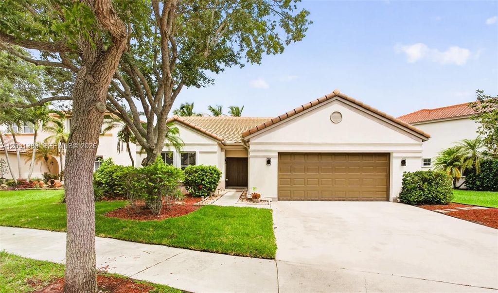 Photo of 370 Carrington Dr, Weston, FL 33326 (MLS # A12031380)
