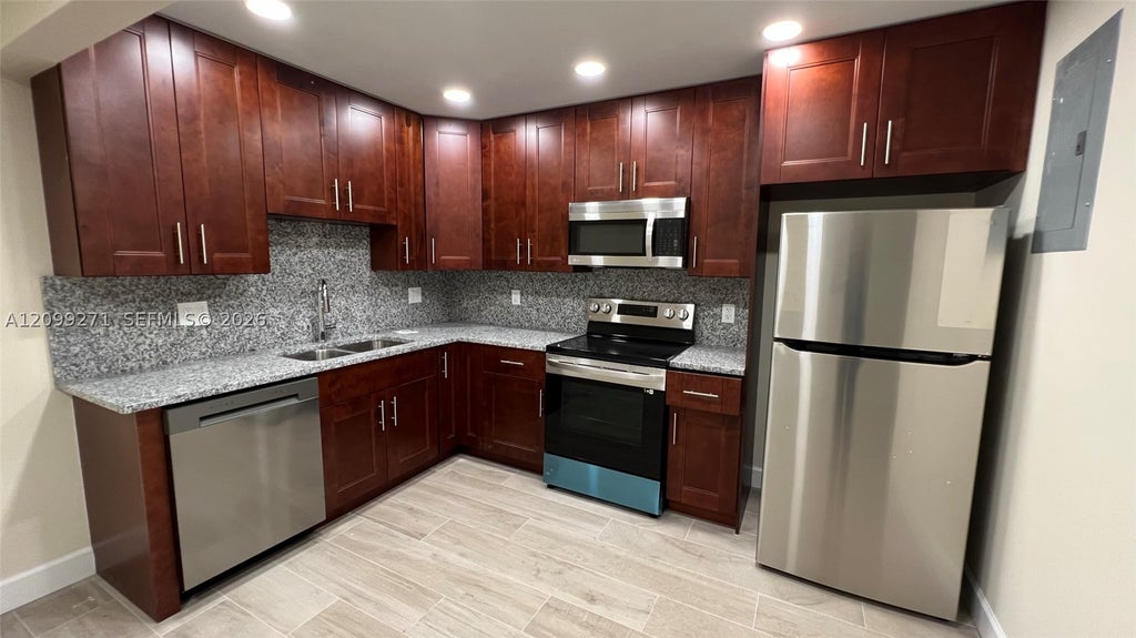 Photo of 2561 NE 10th Ct #2561, Pompano Beach, FL 33062 (MLS # A12099271)