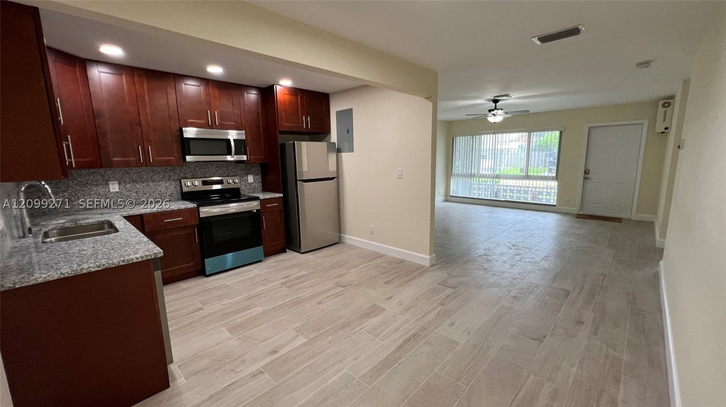 Photo of 2561 NE 10th Ct #2561, Pompano Beach, FL 33062 (MLS # A12099271)