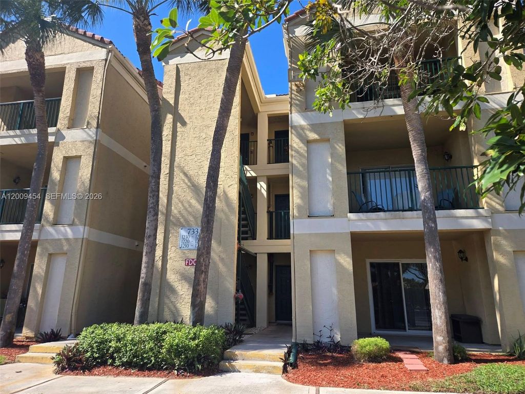 Photo of 733 Riverside Dr #1210, Coral Springs, FL 33071 (MLS # A12009454)