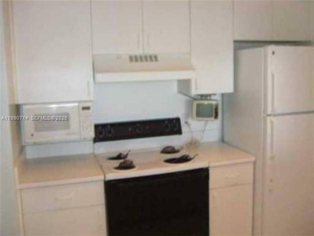 Photo of 12154 Saint Andrews Pl #208, Miramar, FL 33025 (MLS # A11990714)