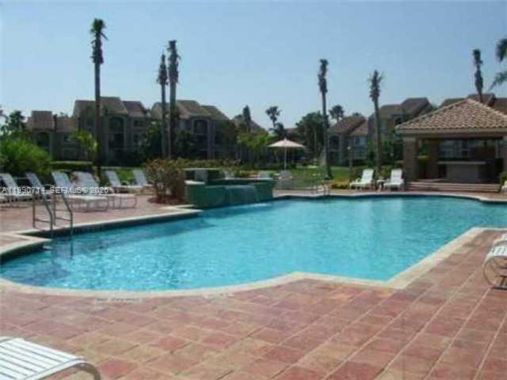 Photo of 12154 Saint Andrews Pl #208, Miramar, FL 33025 (MLS # A11990714)