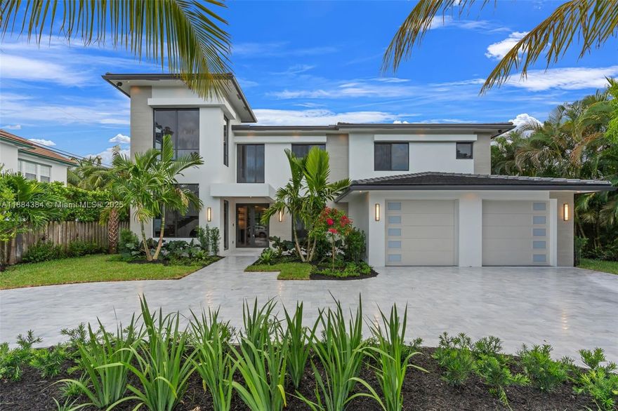 Bask in sun-soaked mornings and savor vibrant downtown nights in this striking new Lake Ida residence set on an oversized lot. This full concrete block & stucco home is designed for both style and comfort, the chef’s kitchen flows seamlessly into expansive living spaces, highlighted by a custom beverage bar, floating glass staircase, and statement light fixtures.  Step into your private retreat: a resort-style outdoor living area with heated & chilled saltwater pool and spa, lush tropical landscaping, and a spacious balcony perfect for sunset views. A marble circular drive, architectural detailing, and a 2-car garage complete this one-of-a-kind property—all just minutes from Atlantic Avenue.